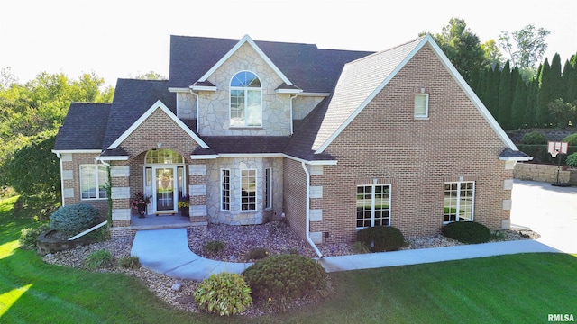 view of front of house with a front lawn