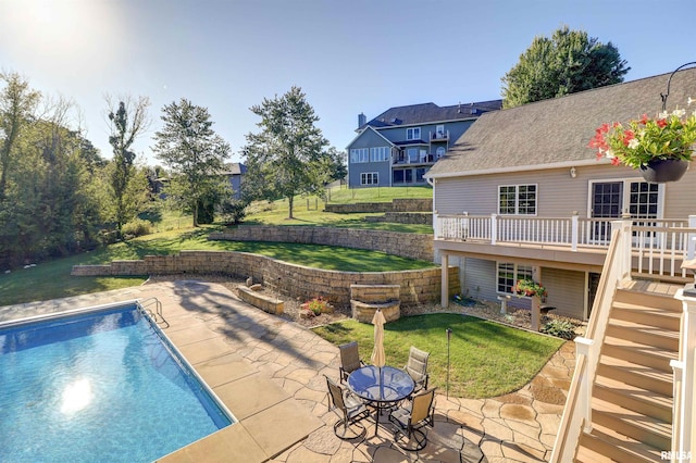 view of swimming pool featuring a patio