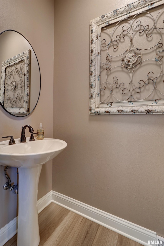 bathroom featuring hardwood / wood-style flooring