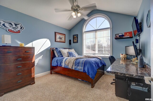 carpeted bedroom with ceiling fan and lofted ceiling