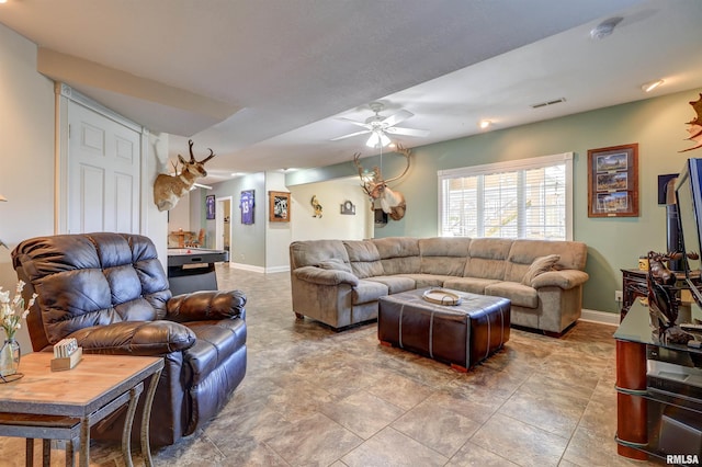 living room featuring ceiling fan