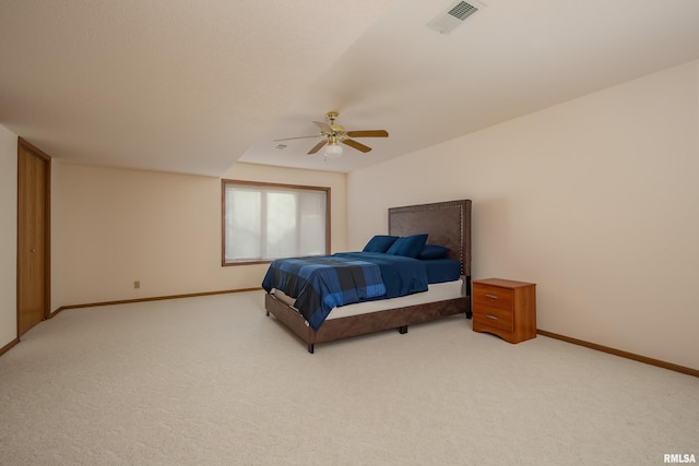 carpeted bedroom with ceiling fan