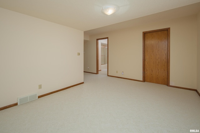 view of carpeted spare room