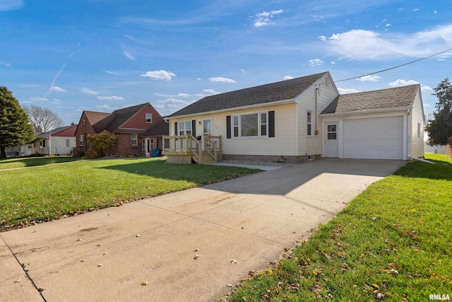 ranch-style house featuring a garage and a front yard