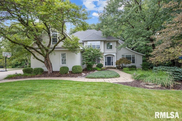 view of front of house with a front lawn