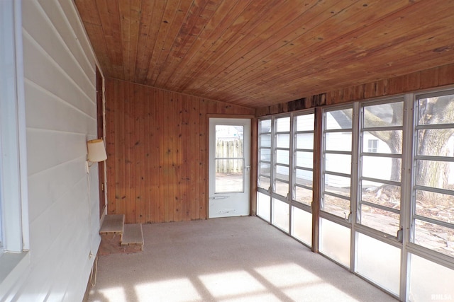 unfurnished sunroom with wood ceiling and vaulted ceiling