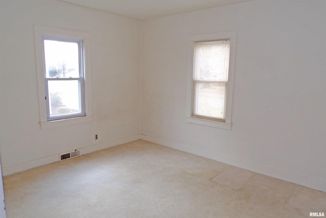 view of carpeted spare room