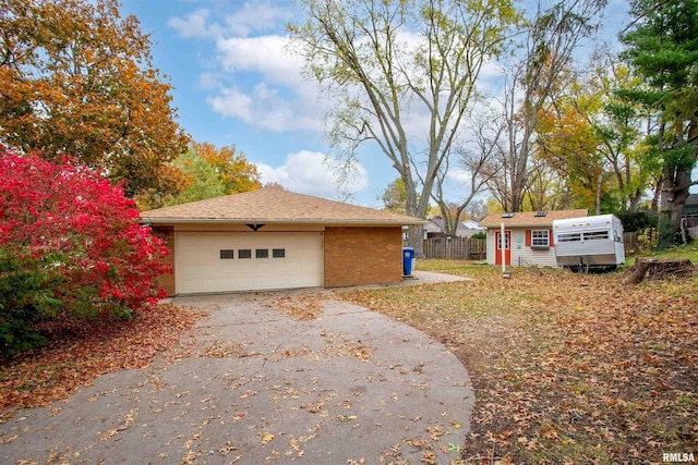 view of property exterior featuring an outbuilding