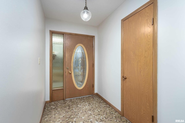 entrance foyer featuring baseboards