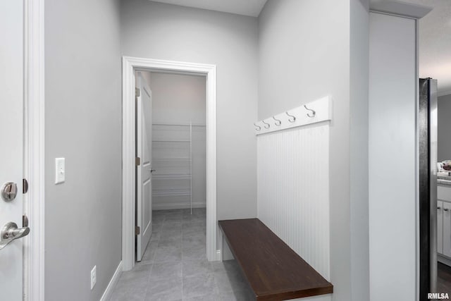 mudroom featuring light tile patterned floors