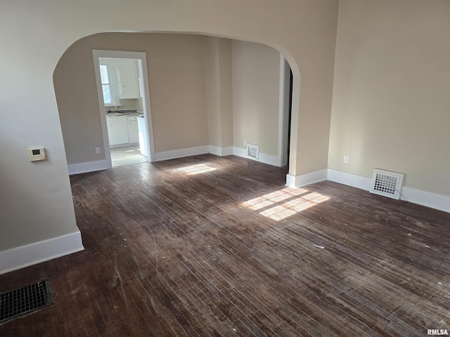 spare room featuring hardwood / wood-style flooring