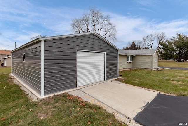 garage with a lawn