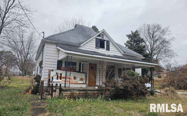 view of front of property featuring covered porch