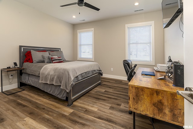 bedroom featuring dark hardwood / wood-style floors and ceiling fan