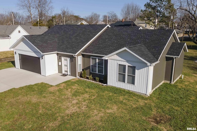 ranch-style home with a front lawn and a garage