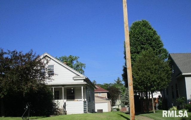 view of property exterior with a yard