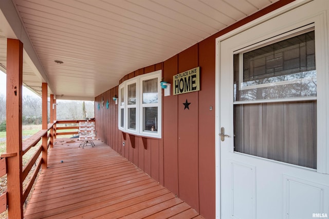 wooden deck featuring a porch