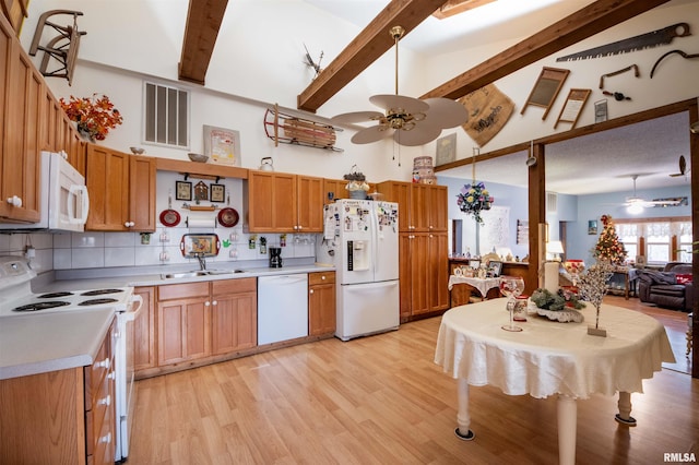 kitchen with white appliances, a ceiling fan, visible vents, and beam ceiling