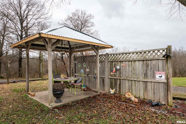 view of yard with a gazebo and fence