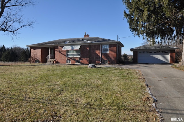 view of front of home with a garage and a front yard