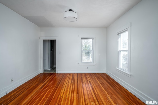 spare room featuring hardwood / wood-style flooring