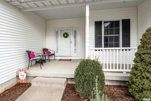 entrance to property with covered porch