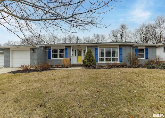 single story home featuring a front lawn and a garage