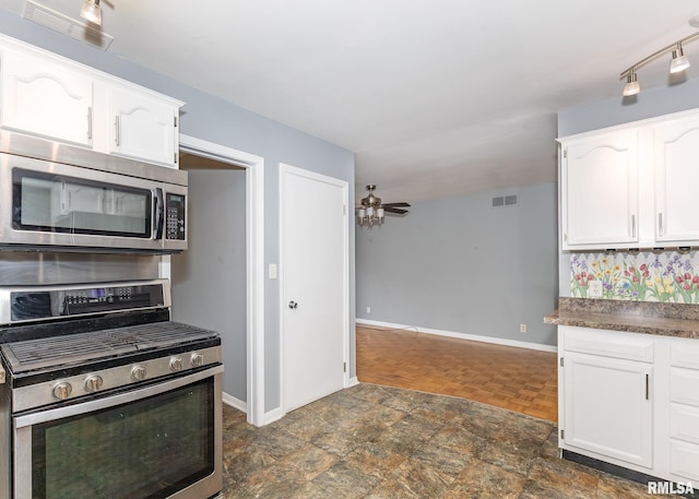 kitchen with white cabinetry, ceiling fan, and appliances with stainless steel finishes