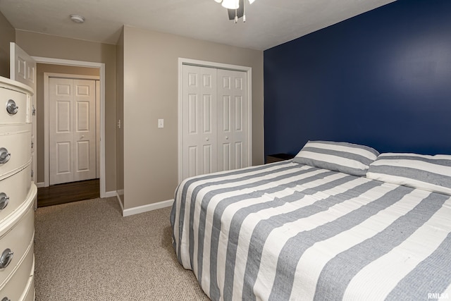 carpeted bedroom featuring a closet