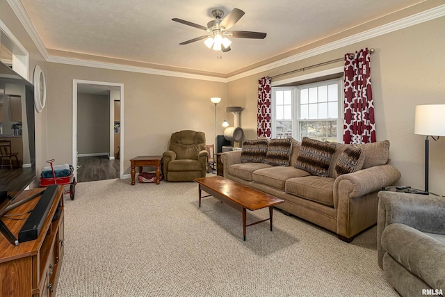 carpeted living room featuring ceiling fan