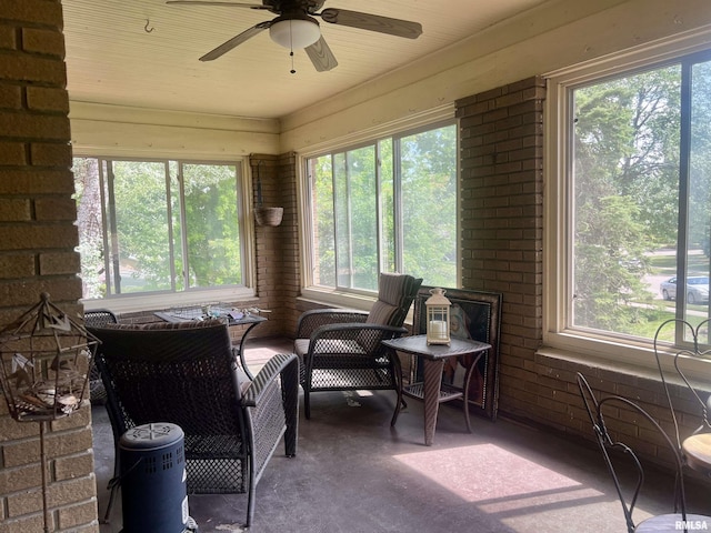 sunroom / solarium with ceiling fan and a wealth of natural light