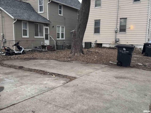 exterior space featuring central AC unit