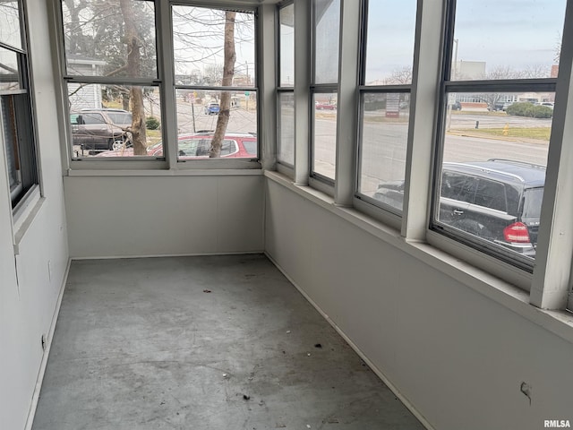 unfurnished sunroom with a healthy amount of sunlight