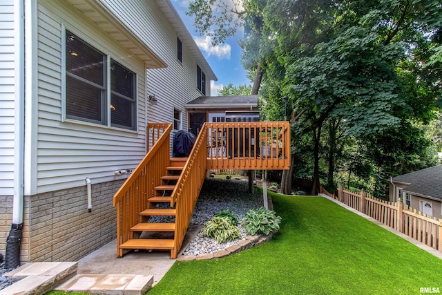 view of yard with a wooden deck