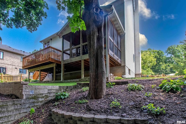 rear view of house with a deck