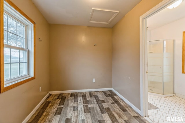 empty room featuring dark hardwood / wood-style flooring