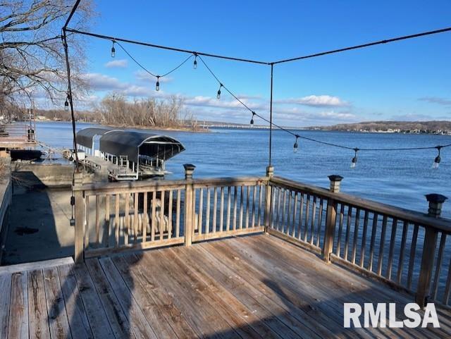 dock area with a water view