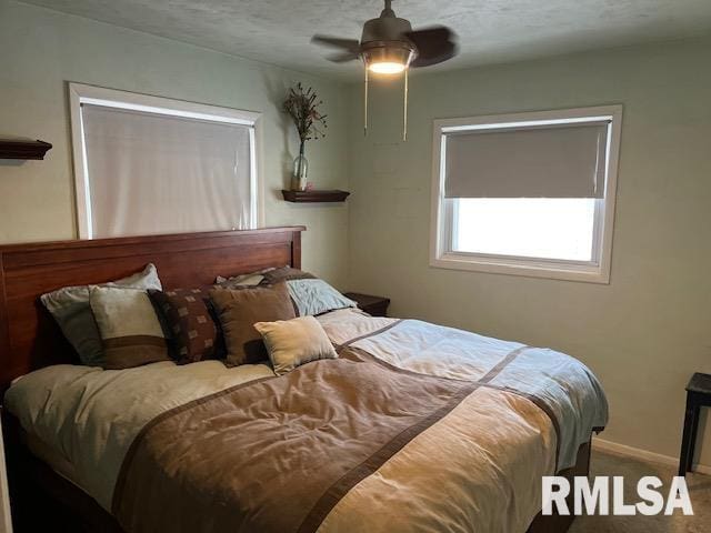 bedroom featuring carpet flooring and ceiling fan