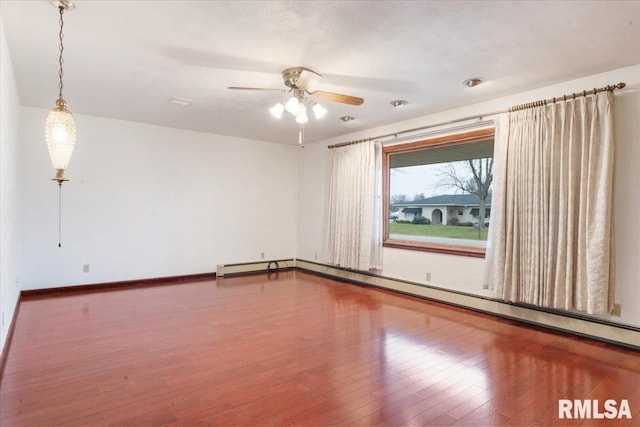 unfurnished room featuring wood-type flooring and ceiling fan