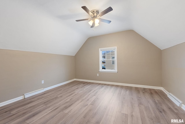 bonus room featuring light wood-type flooring, ceiling fan, and lofted ceiling