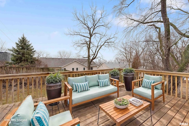 deck featuring outdoor lounge area