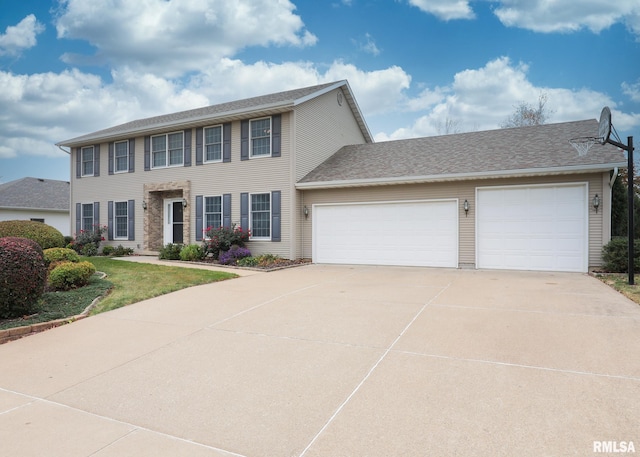 colonial house featuring a garage