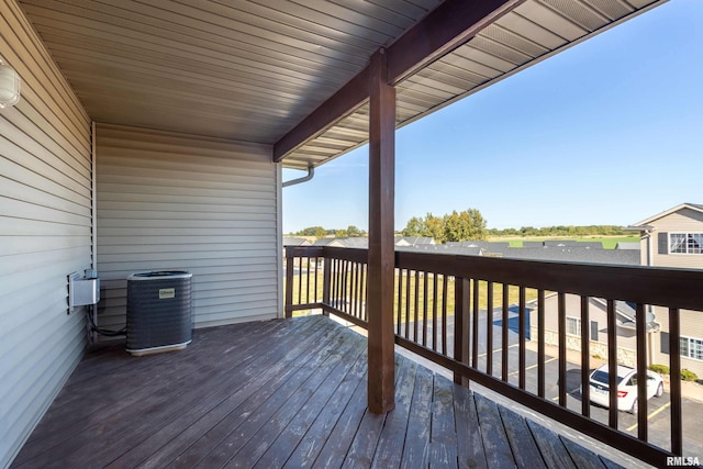 wooden deck with central AC unit