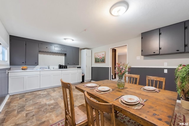 dining room featuring sink