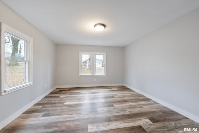 empty room with light wood-type flooring