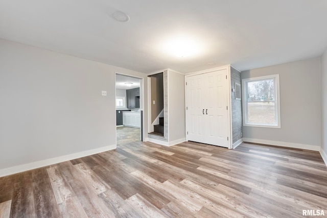 empty room with light wood-type flooring