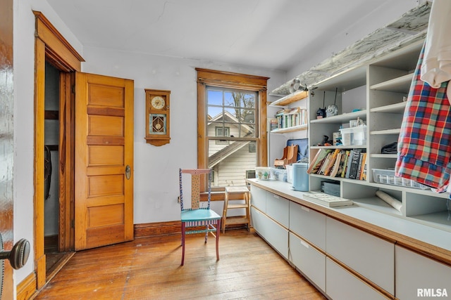 sitting room featuring light hardwood / wood-style floors