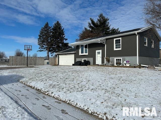 view of front of home with a garage