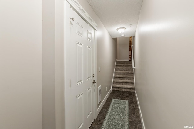 interior space featuring a textured ceiling