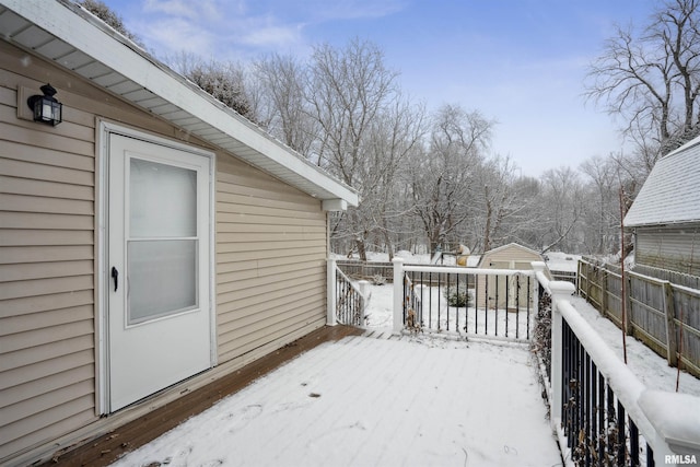 view of snow covered deck